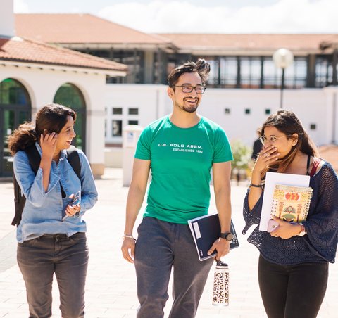 International students walking around Massey University campus