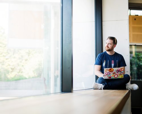 Adult student studying on his laptop