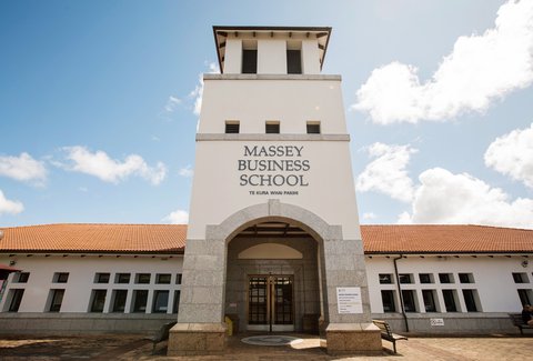 The Massey Business School entrance on a bright day.