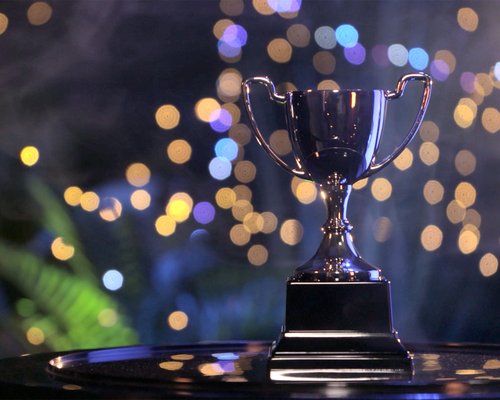 A Blues trophy on a table.
