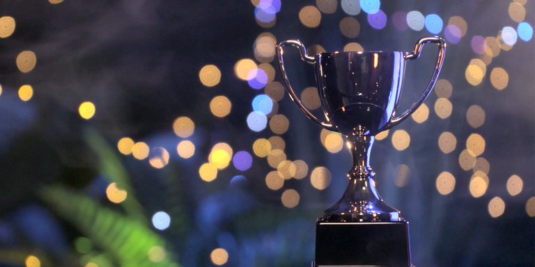 A Blues trophy on a table.