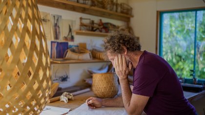 David Trubridge in his workshop working on a design.