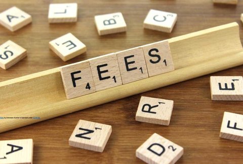 Stock image: Fees spelled out in scrabble letters