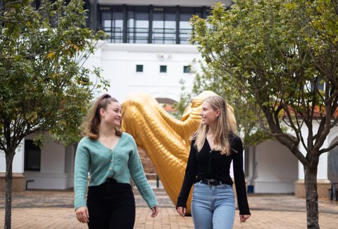 Two students on Auckland campus