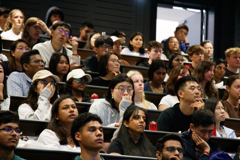 Orientation on Auckland campus. Students in lecture theatre seated for presentation.