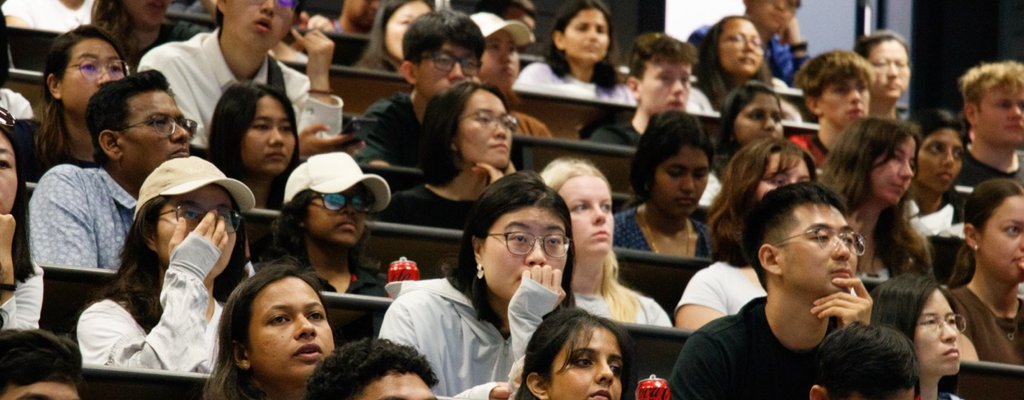 Orientation on Auckland campus. Students in lecture theatre seated for presentation.