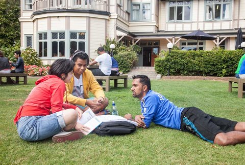 Students relaxing on Massey campus