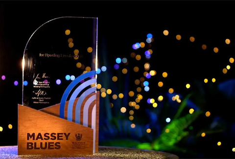 A Massey Blues Award on a table.